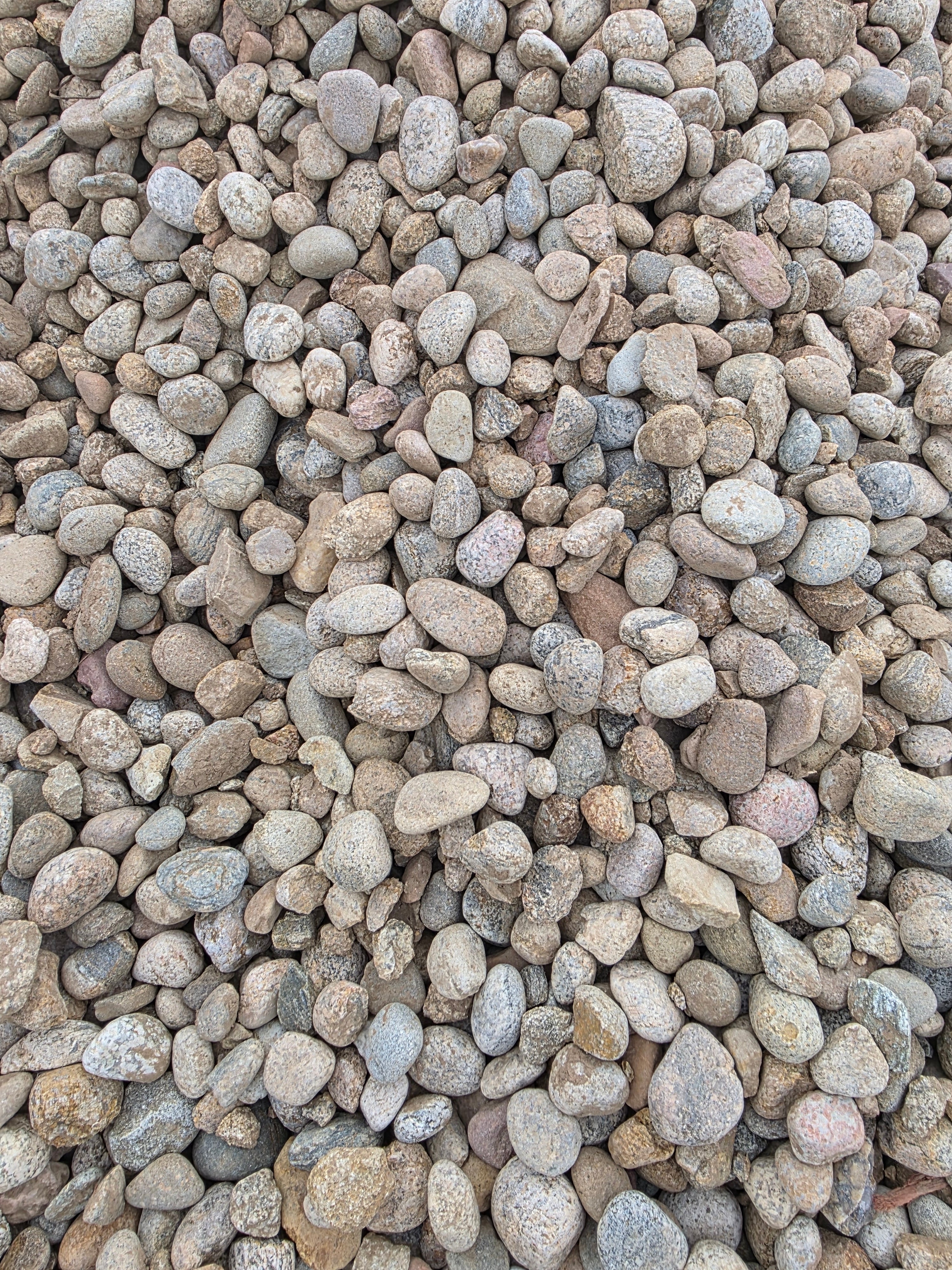 1.5 Local River Rock - Per 1 Ton