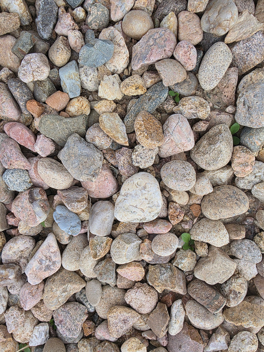 1.5 Local River Rock - Per 1 Ton