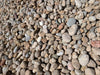 "1 ½” Local River Rock, smooth rounded stones in earthy tones, 1 ton"
