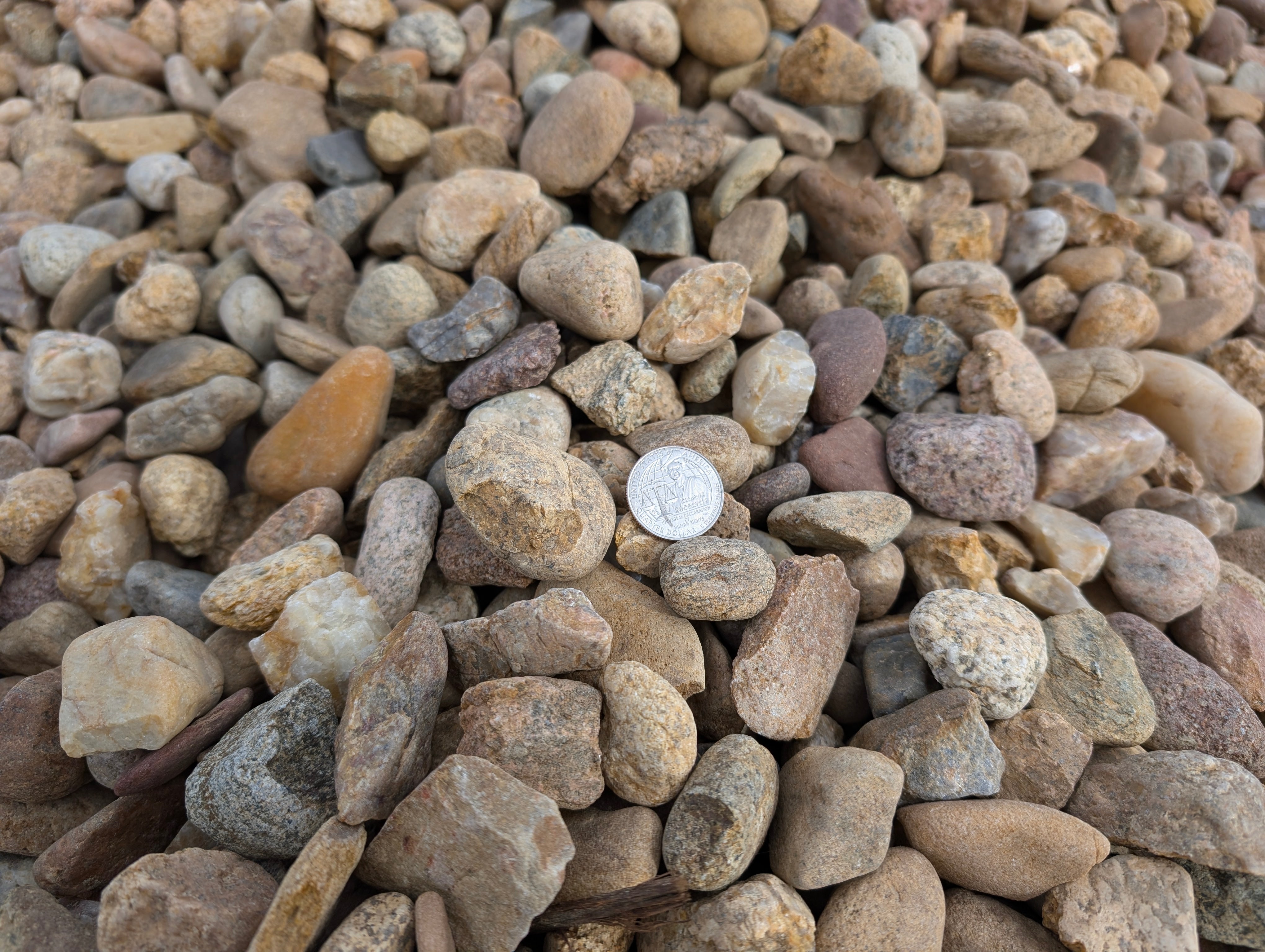 1.5 Local River Rock - Per 1 Ton